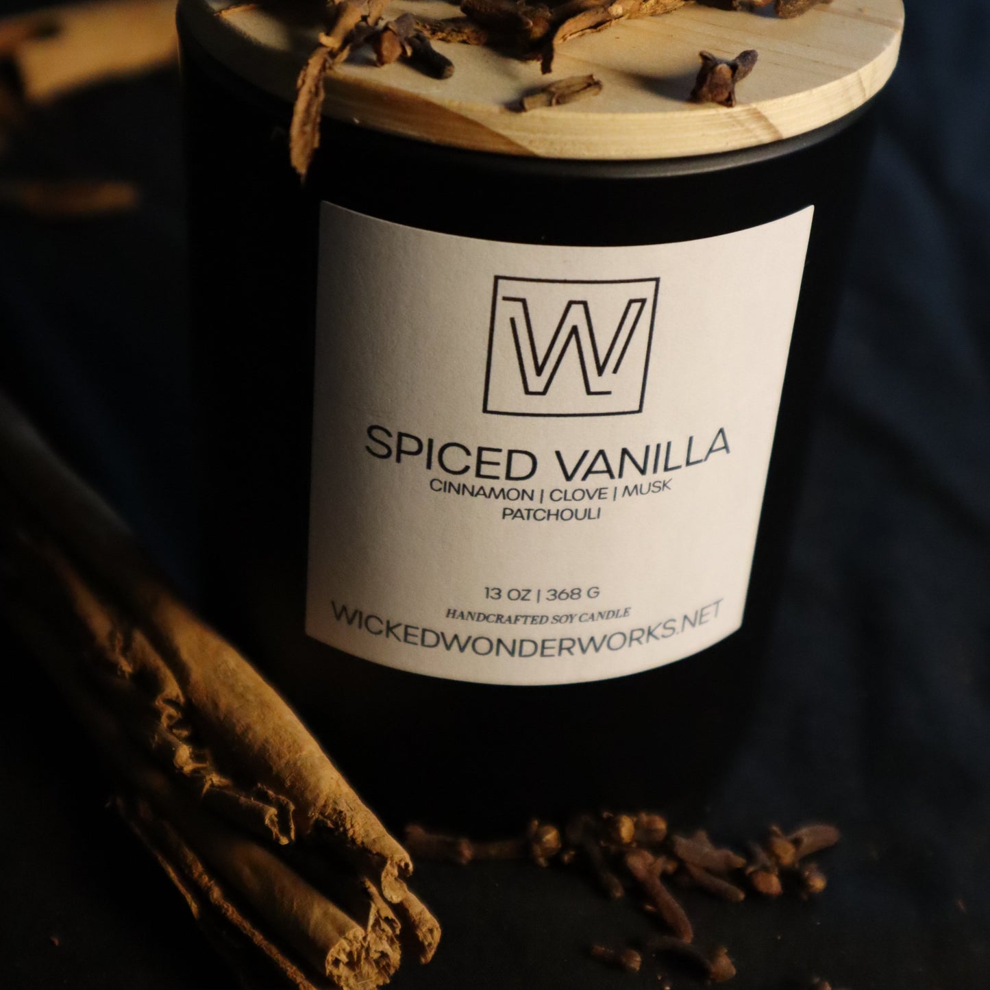 Cinnamon, clove, musk, and patchouli scented soy candle. Spiced Vanilla' by Wicked Wonder Works,